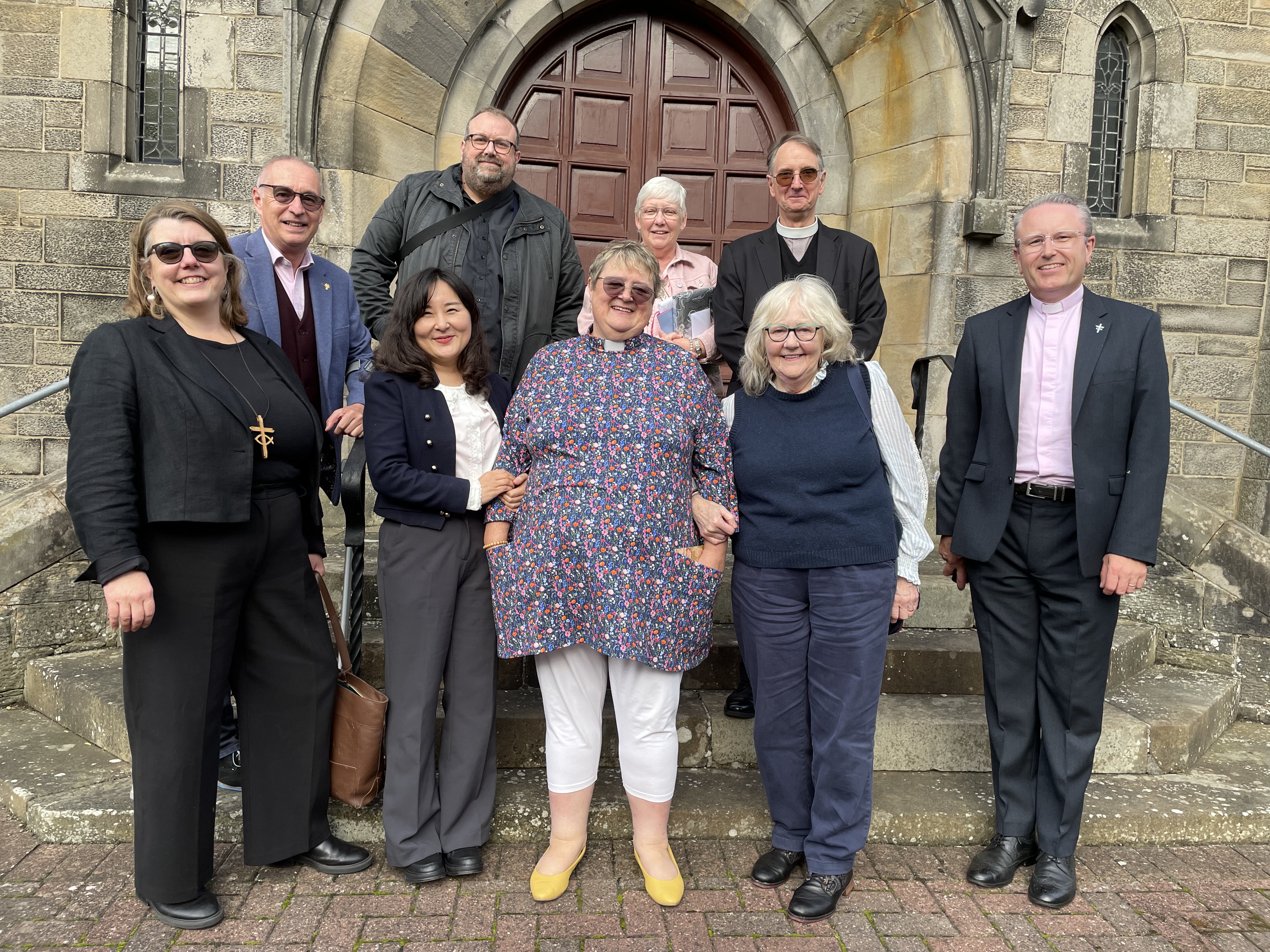 On the steps of Bathgate EU United Reformed Church following the Ordination and Induction of the Revd Eilidh Young